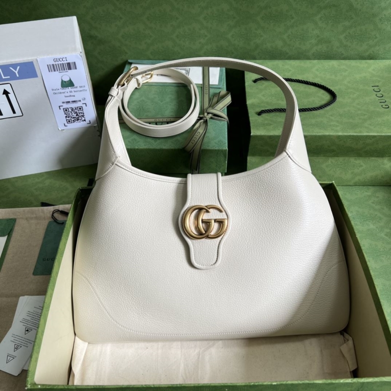 G*u*i top handle bags